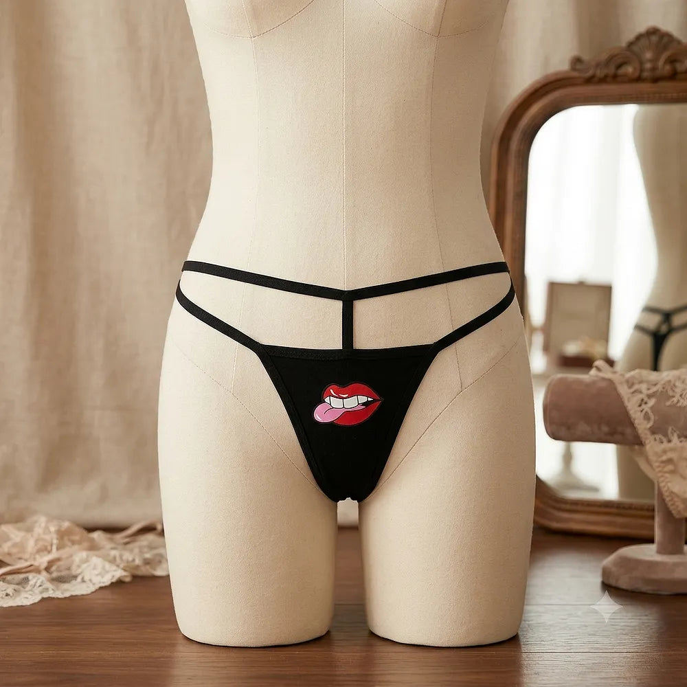Black women's thong with red lips and pink tongue graphic