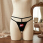 Black women's thong with red lips and pink tongue graphic
