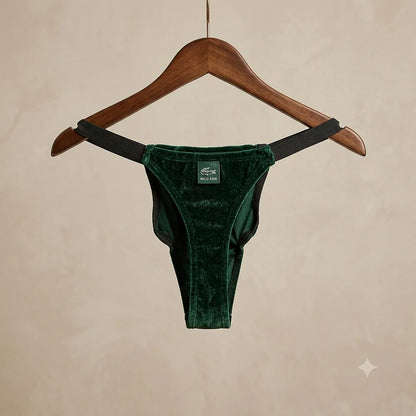 Green crocodile novelty underwear displayed on hanger