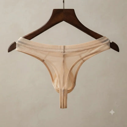 Beige men's thong معلق ويظهر التصميم الخلفي الضيق