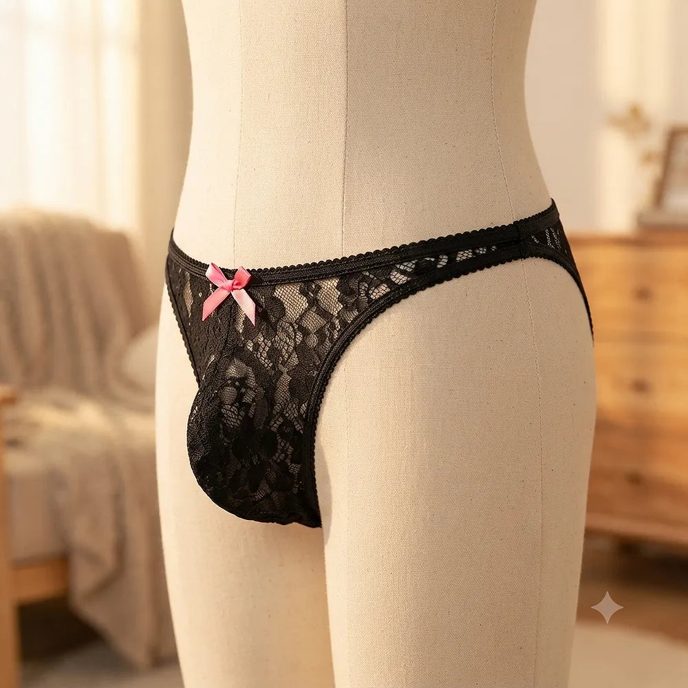 Side view of women's black floral lace thong