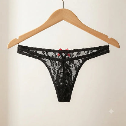 Black floral lace thong displayed on hanger