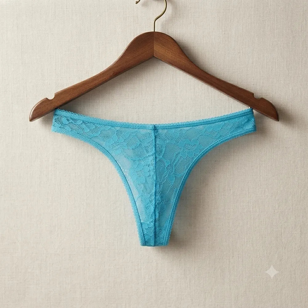 Light blue floral lace thong displayed on hanger