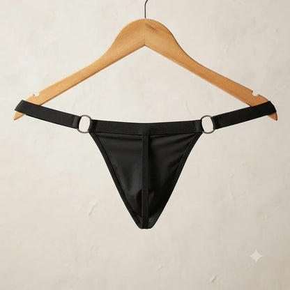 Men's black ring thong hanging with metal rings visible