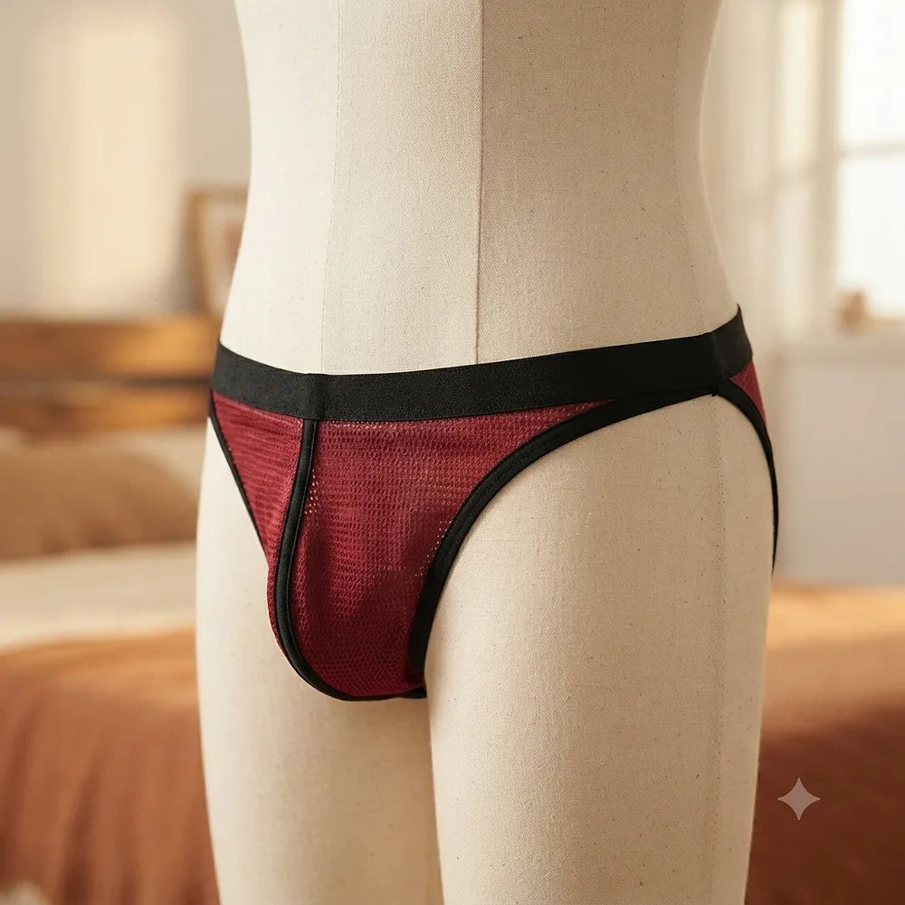 Men's burgundy mesh thong بحواف سوداء من زاوية جانبية