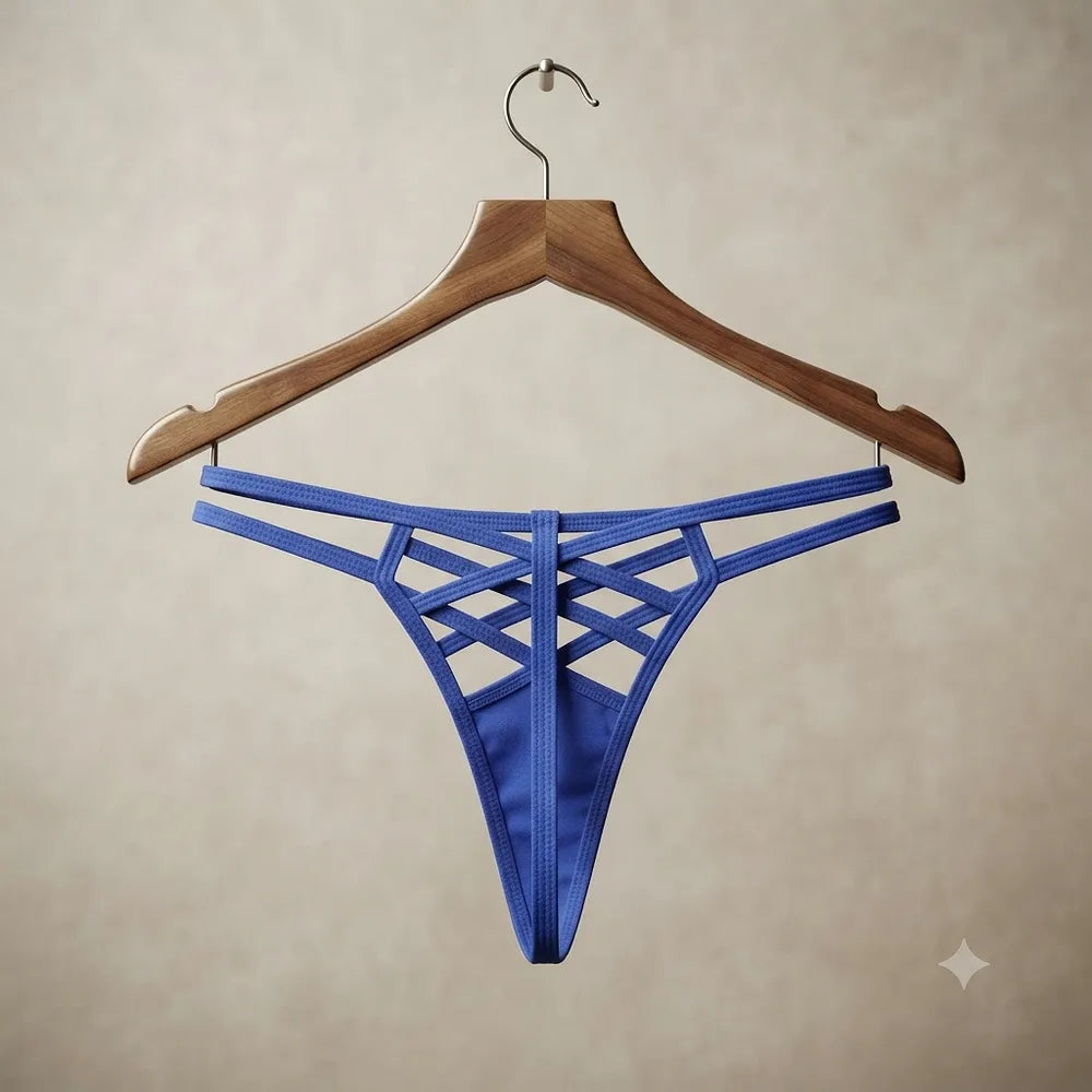 Blue crisscross strap thong hanging on a wooden hanger