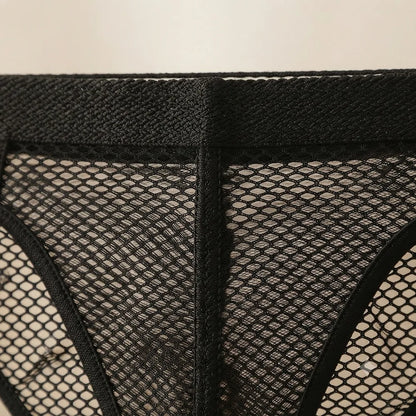 Close-up of open mesh panel construction and wide black waistband