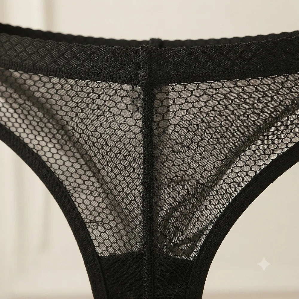 Detailed close-up of black mesh brief construction