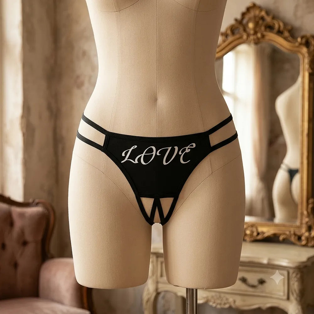 Women's black thong with two parallel straps on each side