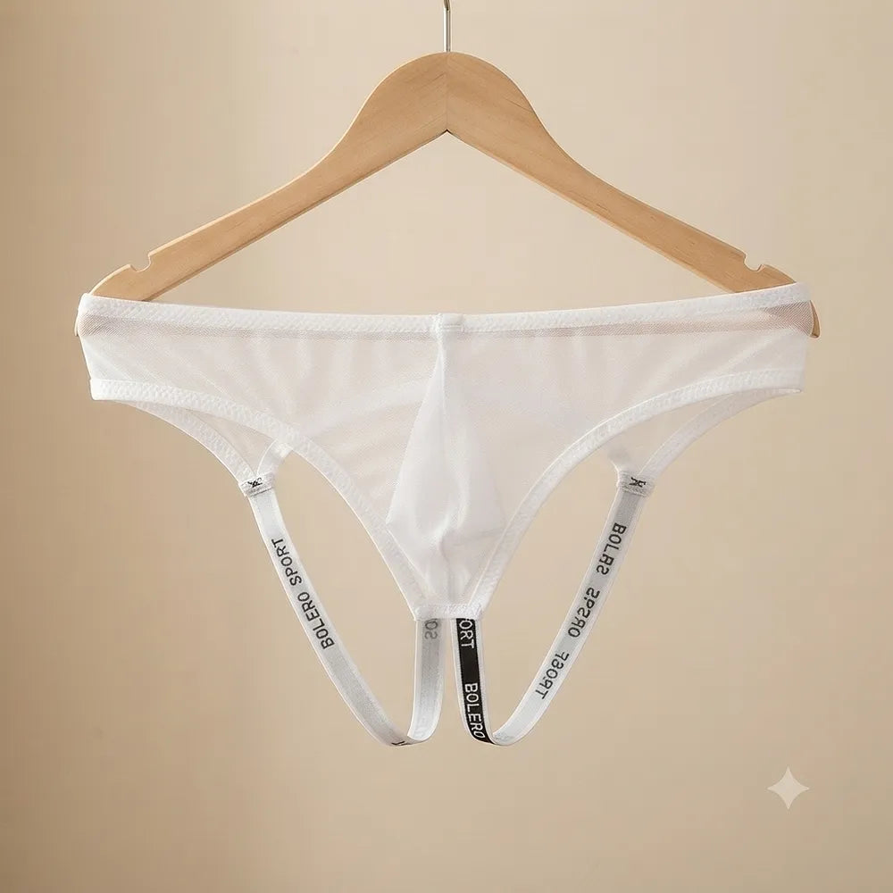 White leg strap brief معلق بالكامل وتظهر الحمالتان السفلية بوضوح