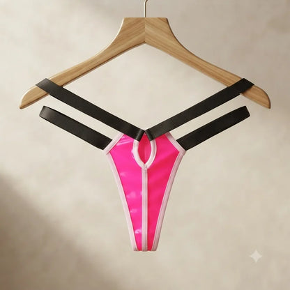 Pink cutout strappy thong on wooden hanger