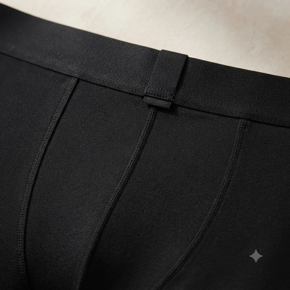 Detail of black waistband and seam construction