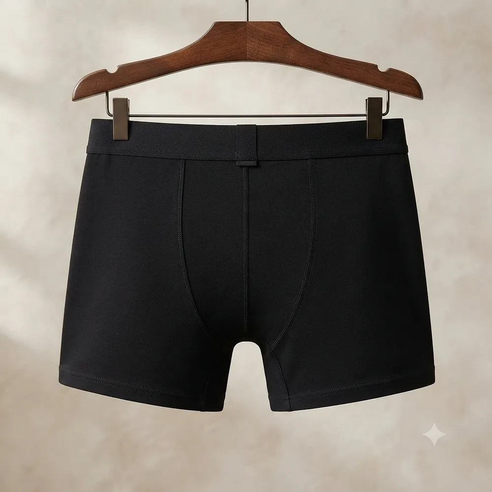 Rear view of black boxer brief on hanger